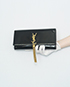 Cassandra Tassel Clutch, front view